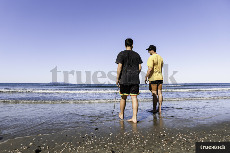 Adult and Kid at Beach