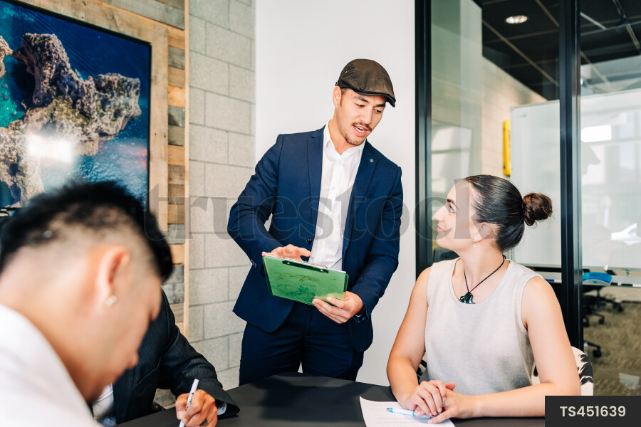 Businesspeople talking during meeting in boardroom