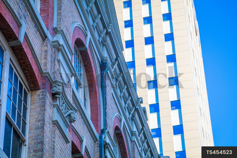Buildings with brick walls and arch features