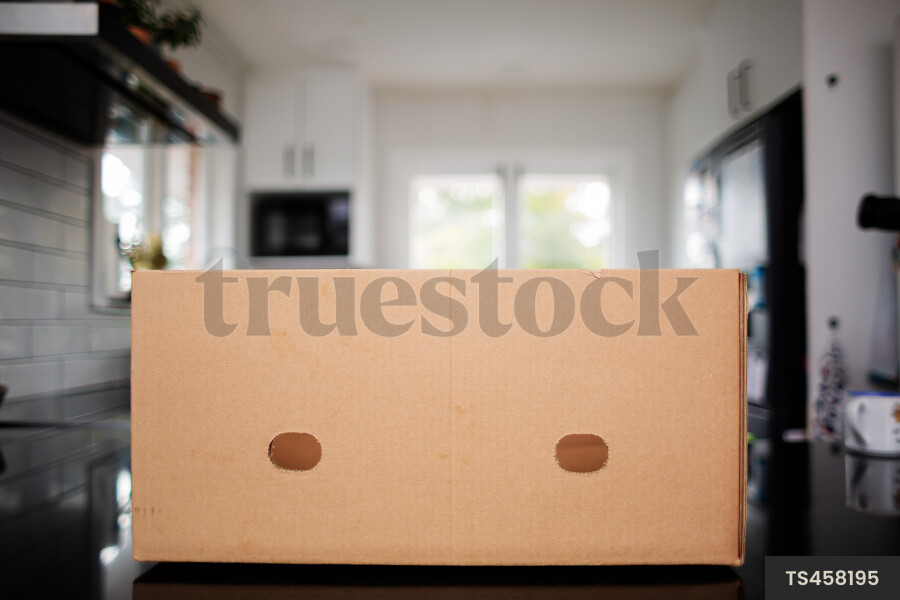 Cardboard box in kitchen