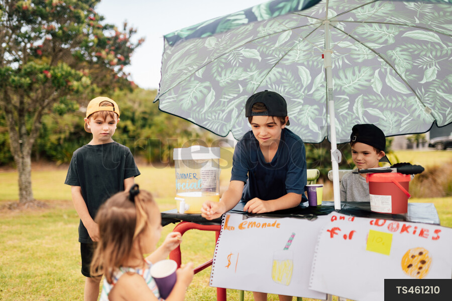 Kids Buying Lemonade at Lemonade Stand