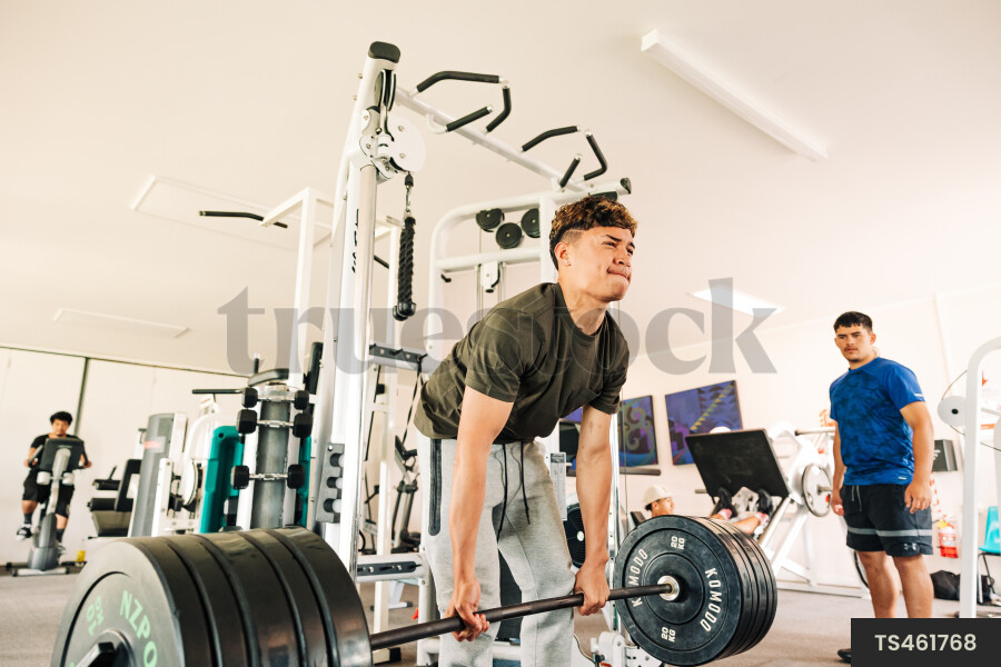 Teenagers Working Out at Gym