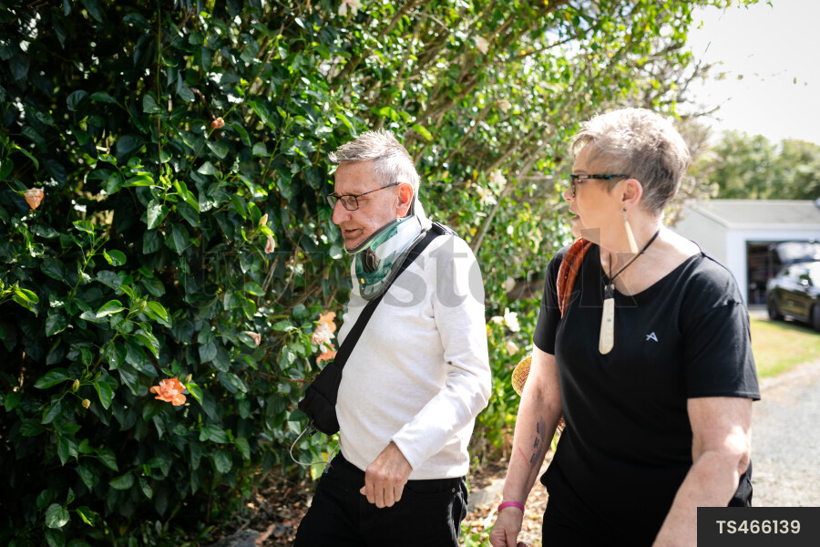 Health carer walking with patient