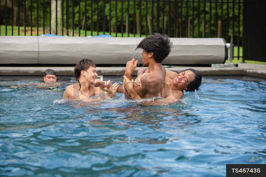 Teens Playing in Pool