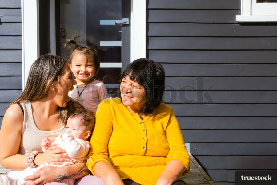Whānau Sitting on the Deck