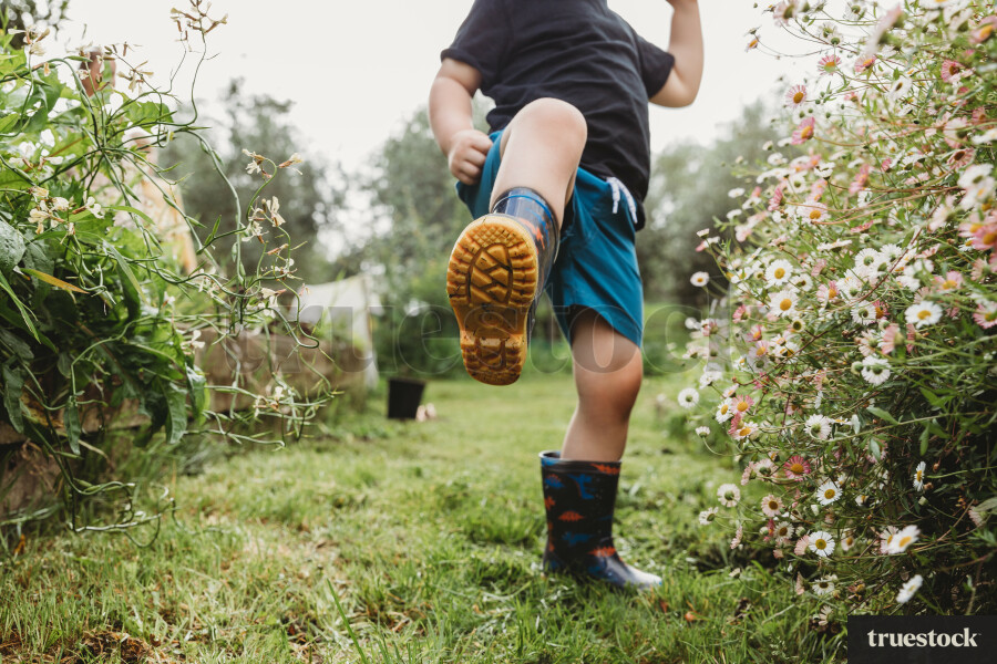 Boy in gumboots