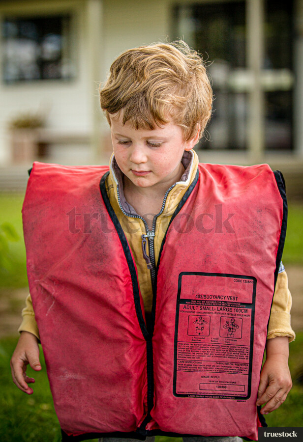 Toddler wearing a lifejacket