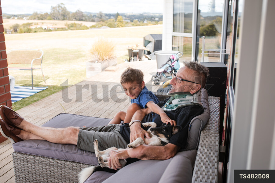 Man sitting with his grandson