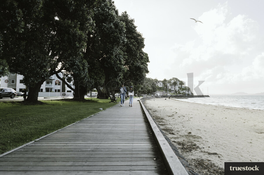 Young Girl Riding on Scooter