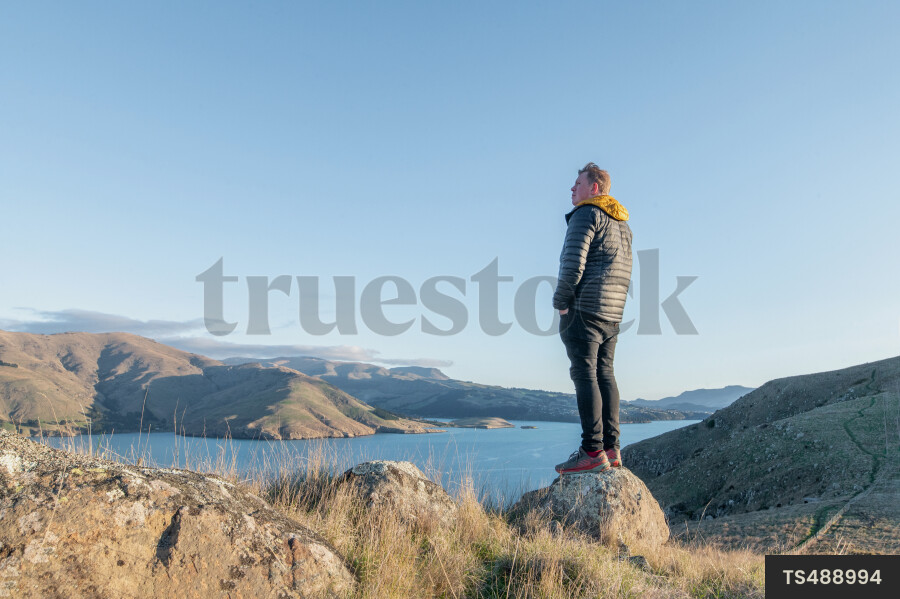 Man on rock at Godley Head, Canterbury