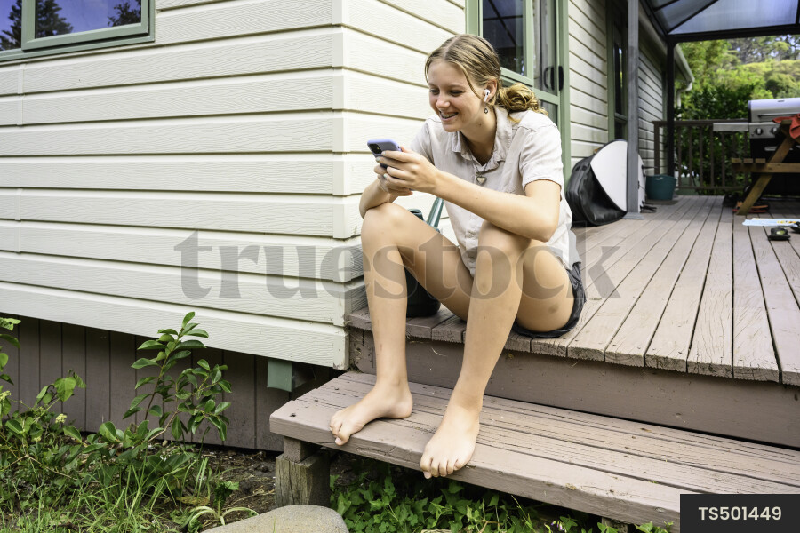 Teen Girl Using Phone