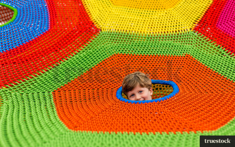 Child at the playground and smiling