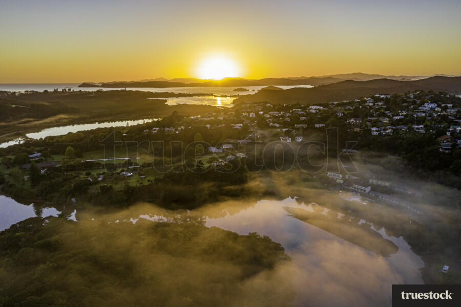 Aerial of town at sunrise