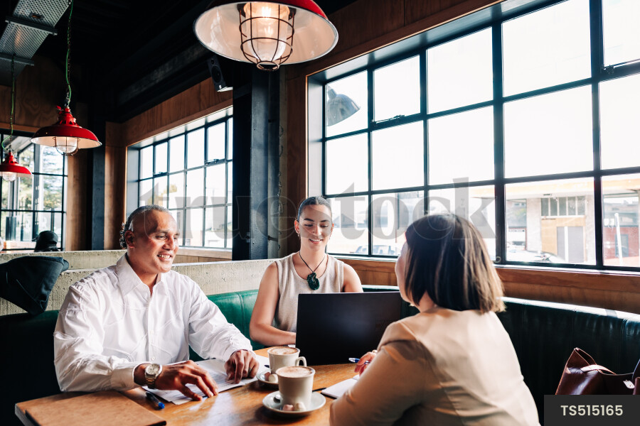 Businesspeople meeting at cafe