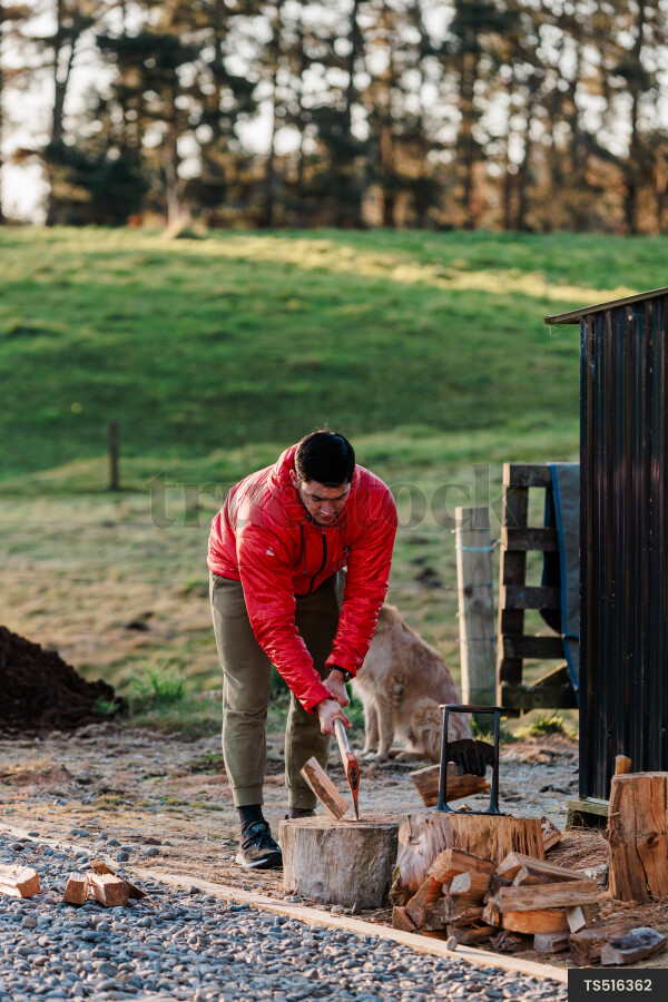 Man Cutting Wood