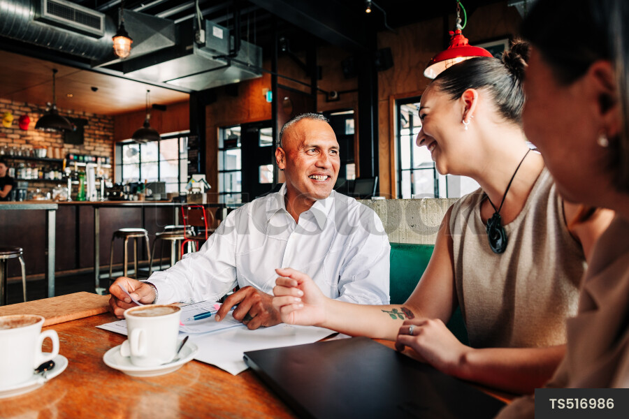 Businesspeople meeting at cafe