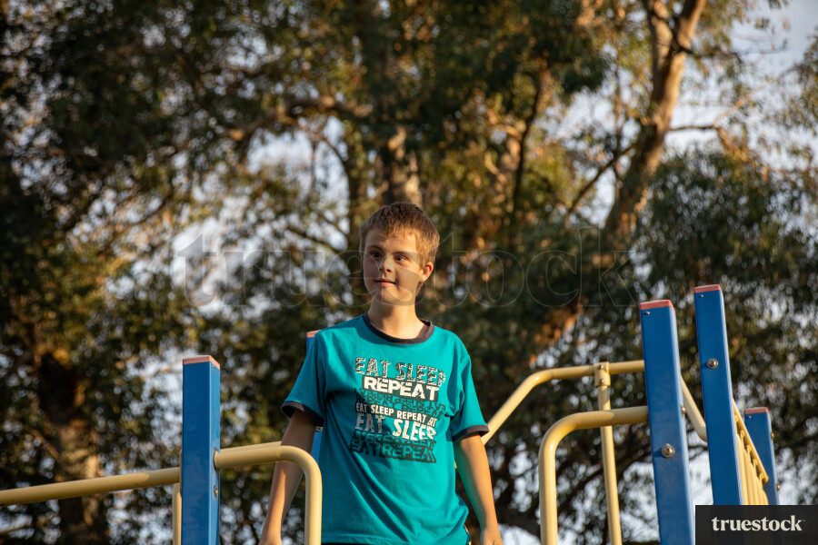 Boy Playing on a Playground in Timaru