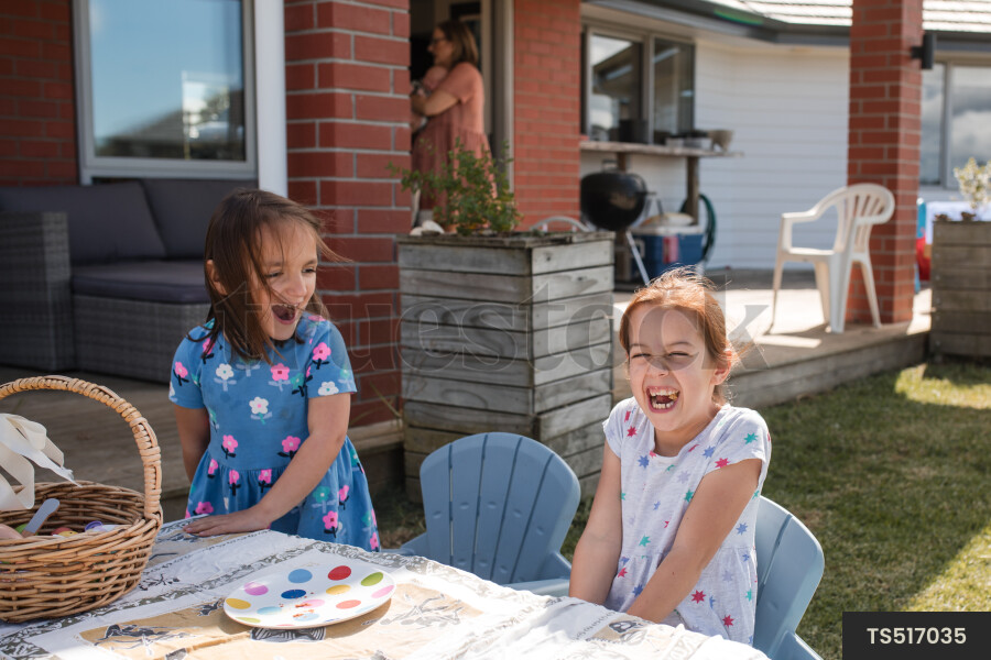 Girls sitting at table