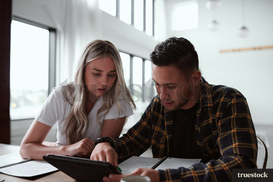 Young couple with ipad