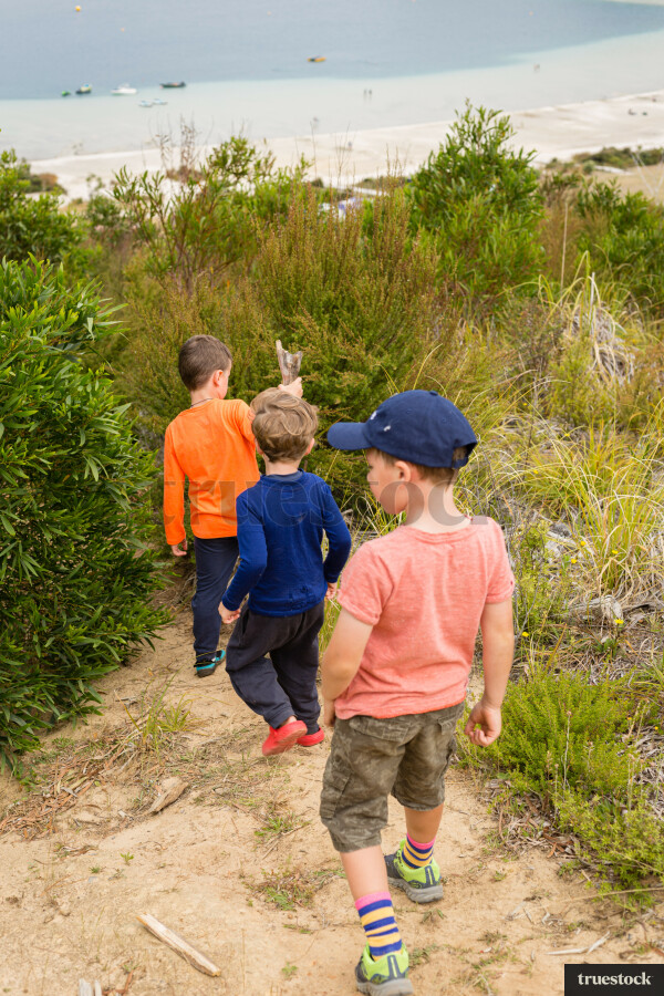 Children walking at Kai Iwi lakes