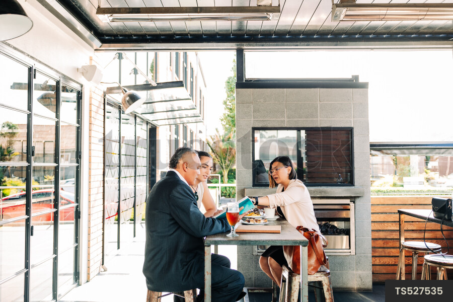 Businesspeople meeting at cafe