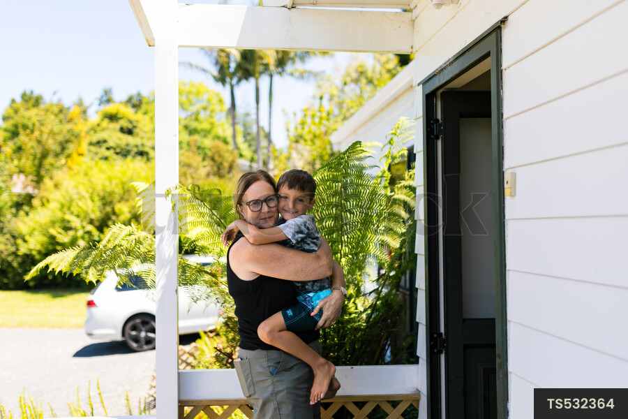 Woman holding her grandson
