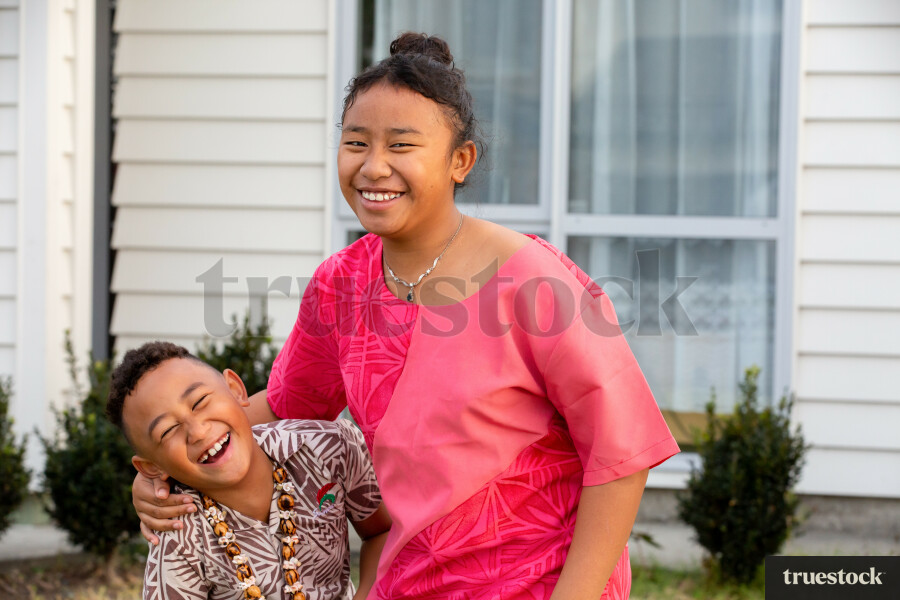 Brother and Sister Outside Home