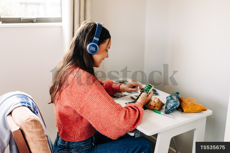 Young woman studying at desk