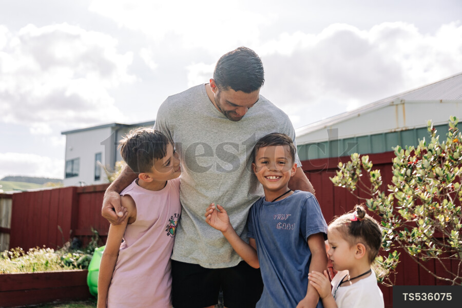 Father and Kids in Backyard