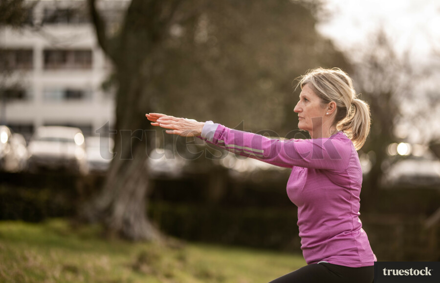 Woman Exercising In Cornwall Park