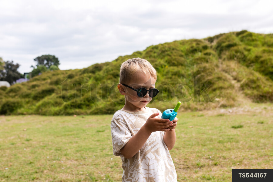 Boy with walkie talkie