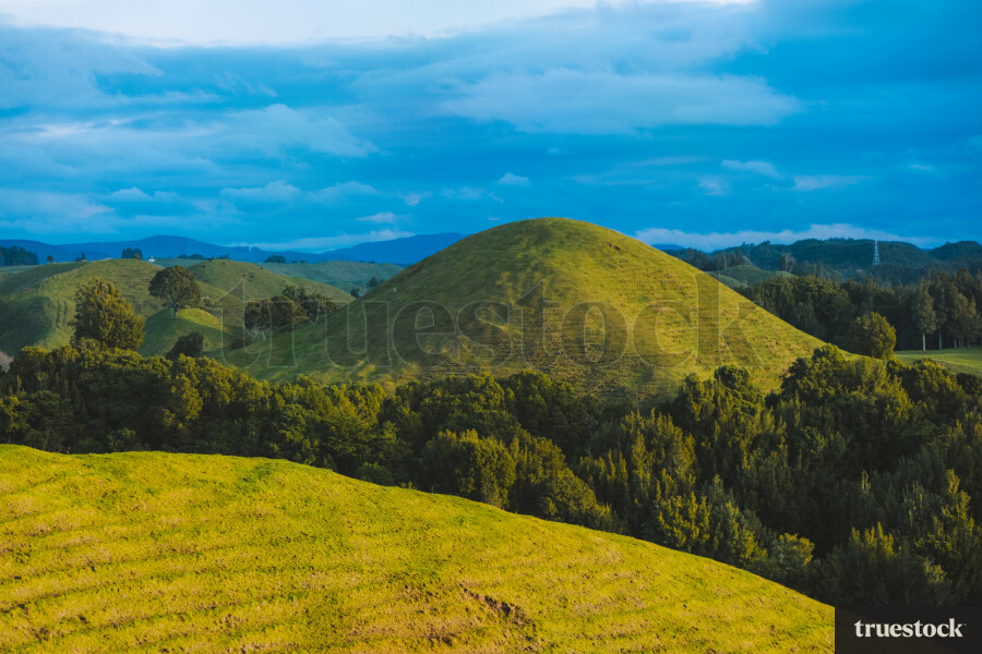 Farming countryside with hills