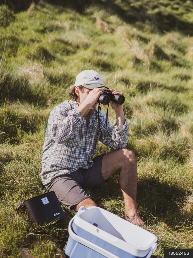 Man Using Binoculars