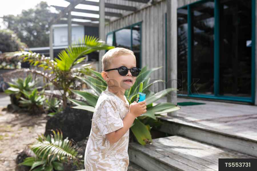 Boy playing in garden
