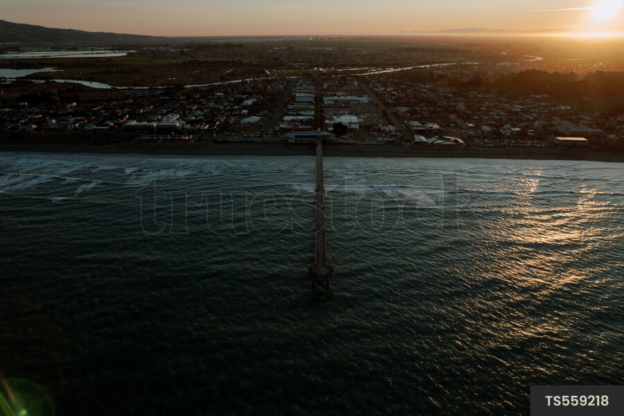 Aerial view of New Brighton Pier at sunset in Christchurch
