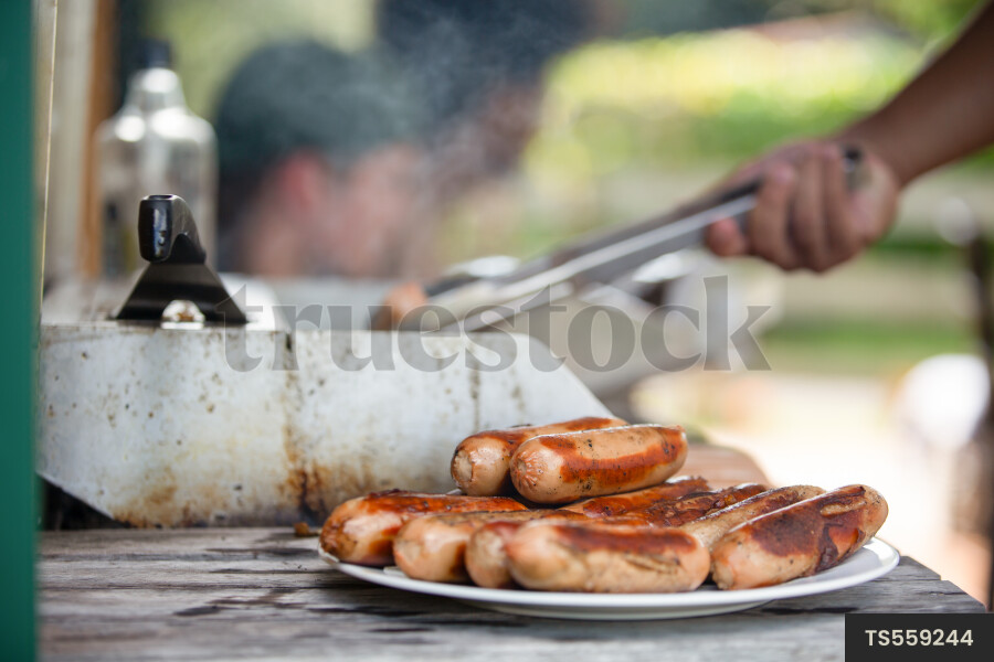 Teens Cooking Dinner