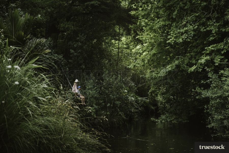 Kids Fishing at a Stream