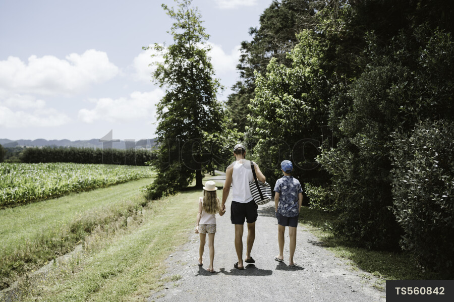 father and Kids on Rural Path