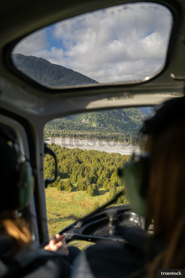 Helicopter flight over the mountains
