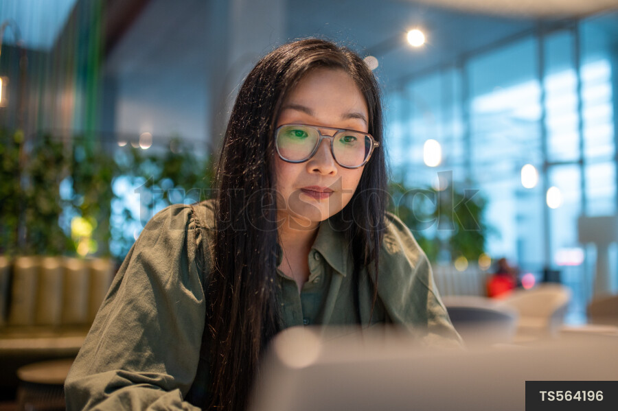 Woman Using Laptop for Work