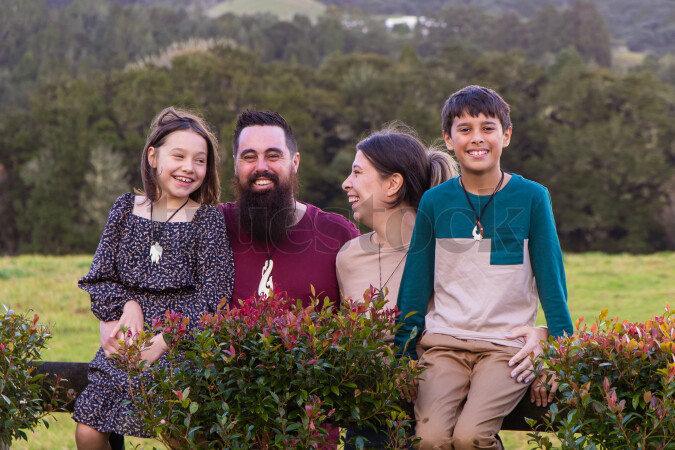 Family on Fence