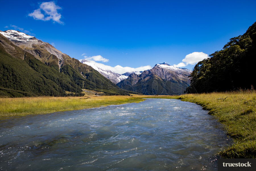 River and mountain ranges on a clear day