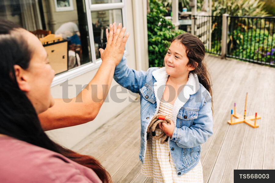 Girl with her parents on deck