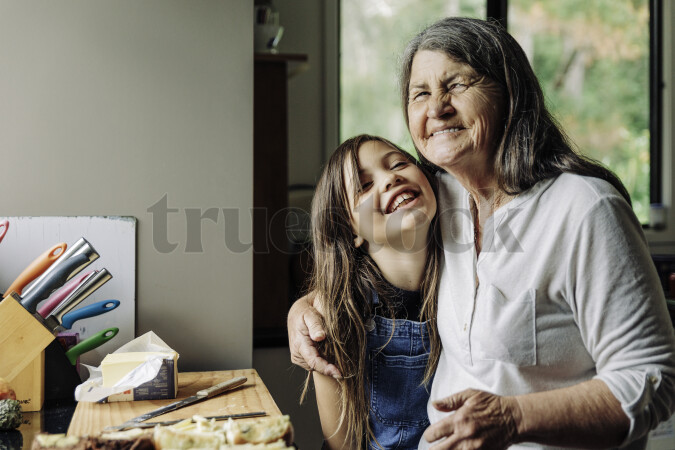 Young Girl and Grandma in Kitchen