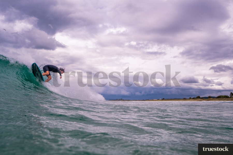 Surfing waves in Ruakaka