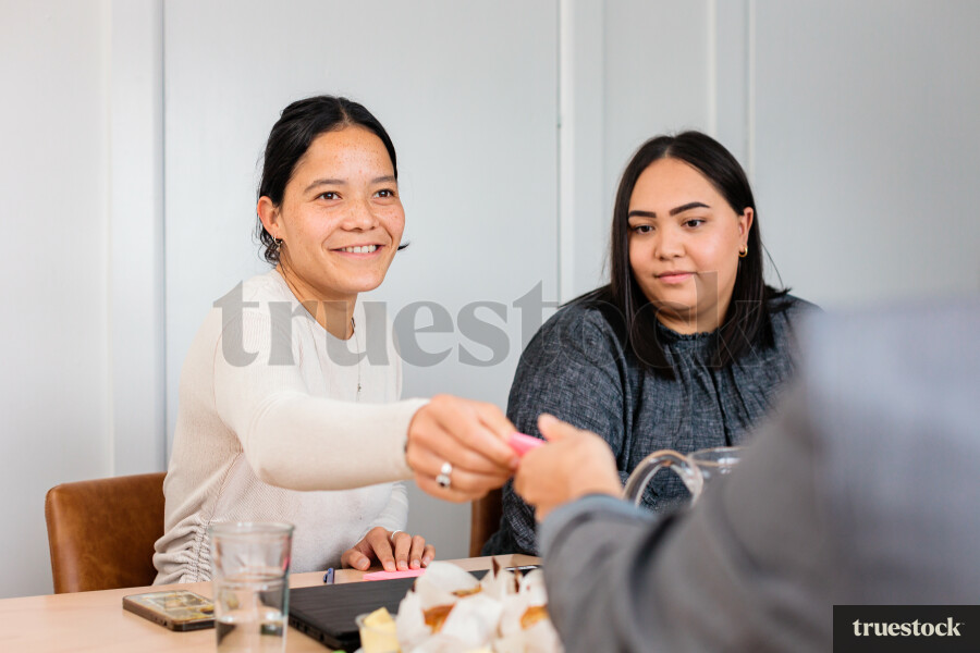 Colleagues Having Discussion in Meeting