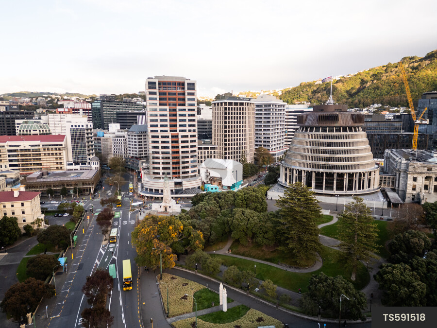 Aerial view of cars and buses on road in city