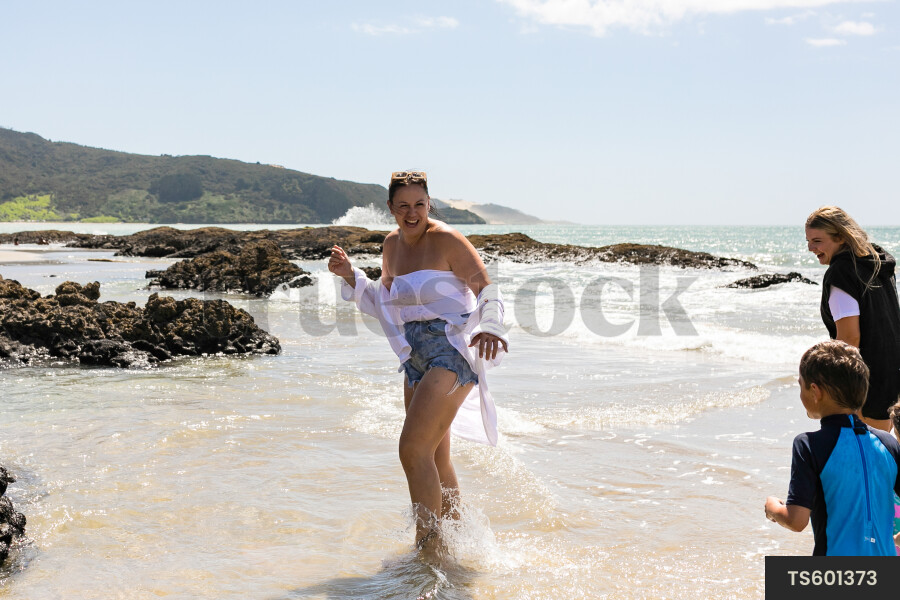 Family playing on beach