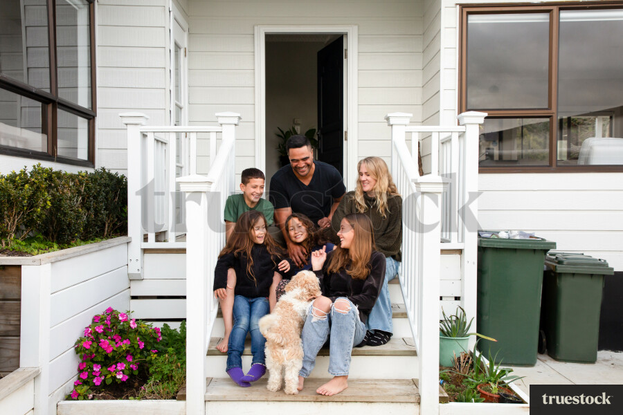 Family Photo Outside Front Door