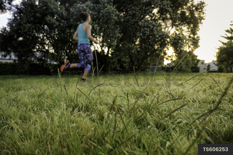 Woman Running at Park